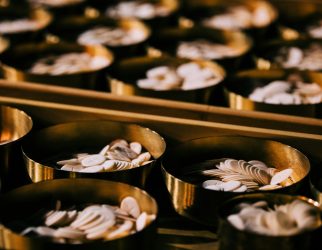 selective focus photography of coins on round container