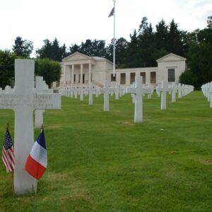 white and brown house with green grass field
