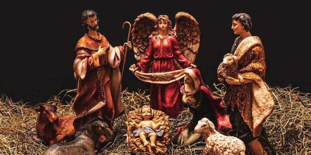 3 men sitting on ground